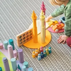 Grimm's Stapelrollers 12st - Pastel -Janod Winkel grimm s stapelrollers 12st pastel 8